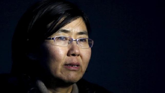 China jails rights activist on spying charges as crackdown widens